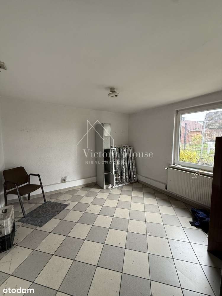 Teren usługowy z zabudowaniami.-19