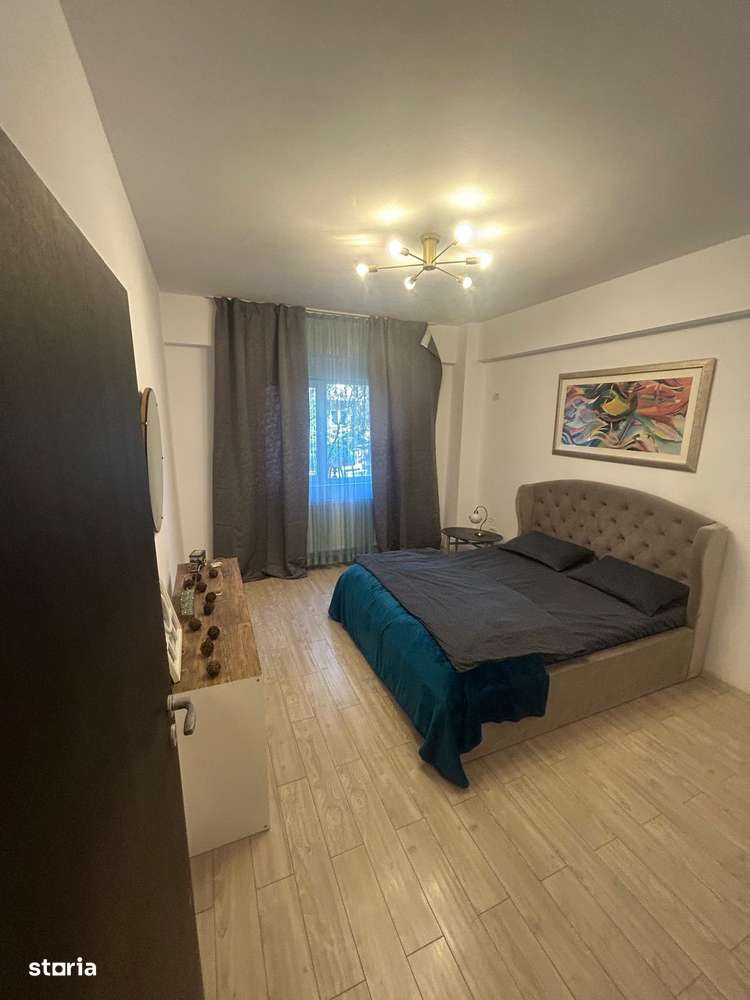 Apartament mobilat- balcon inchis - Imagine principală: 3/8