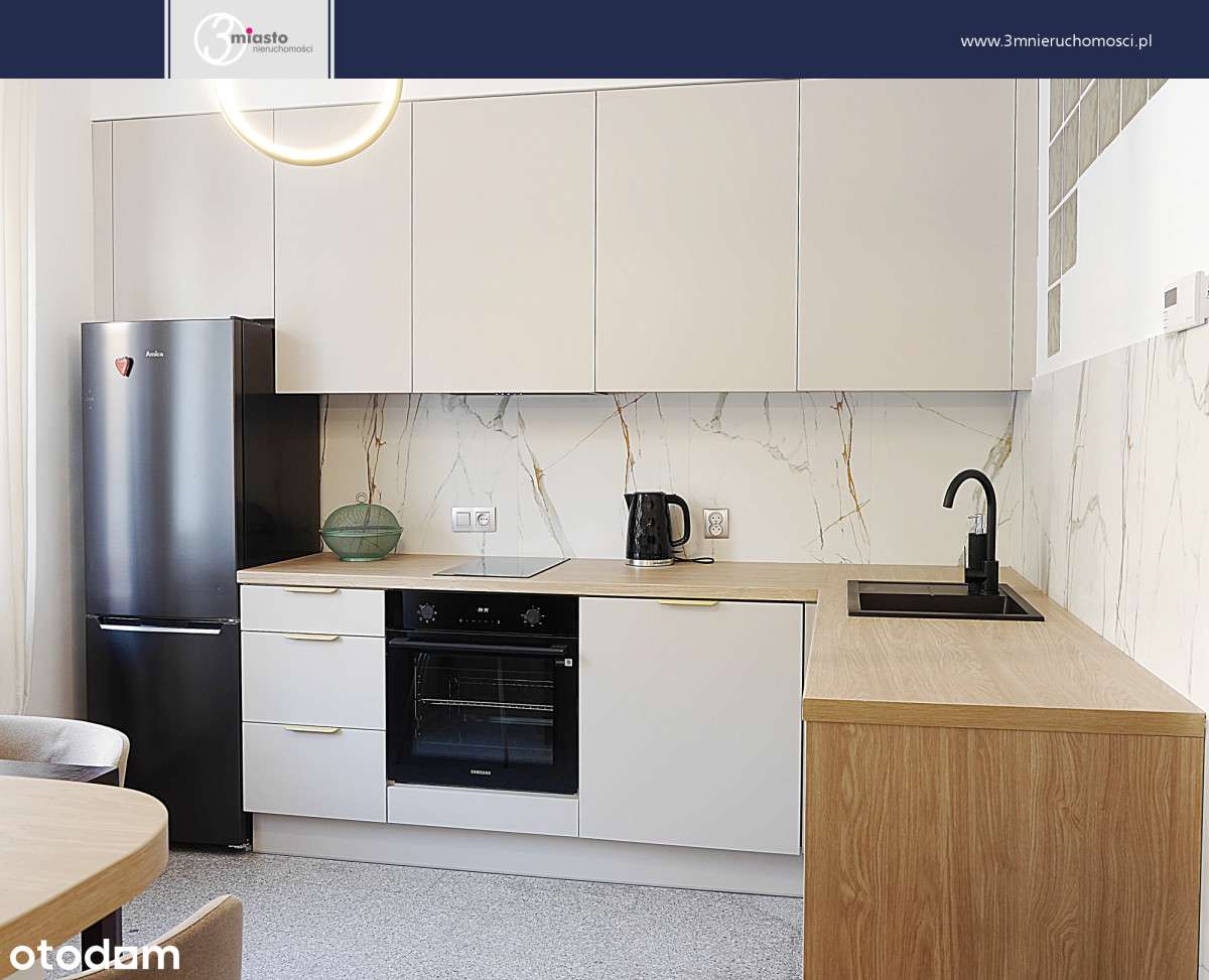 Atrakcyjna przestronna kawalerka-0