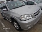 WYPRZEDAZ MAZDA TRIBUTE LIFT LAMPA przednia LEWA PRAWA  oryginal czesci euro - 15