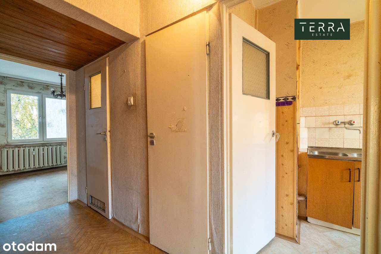 Dwupokojowe mieszkanie do remontu na parterze z balkonem i ogródkiem-10