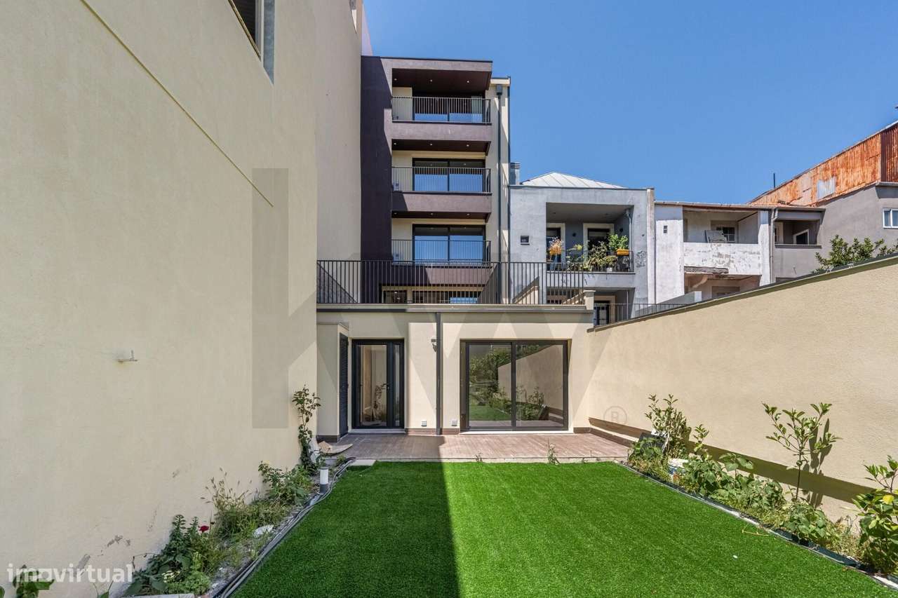 T1 + 1 novo com jardim junto da Av. dos Aliados - Grande imagem: 5/17