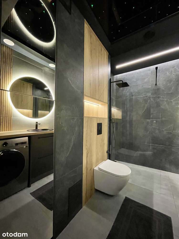 Nowoczesne Mieszkanie 63,07 m² z Miejscem Garażowym i Ogrodem-4