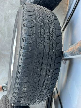 Jante Jeep Wrangler Rubicon cu cauc 255/70/R18 Bridgestone - 12