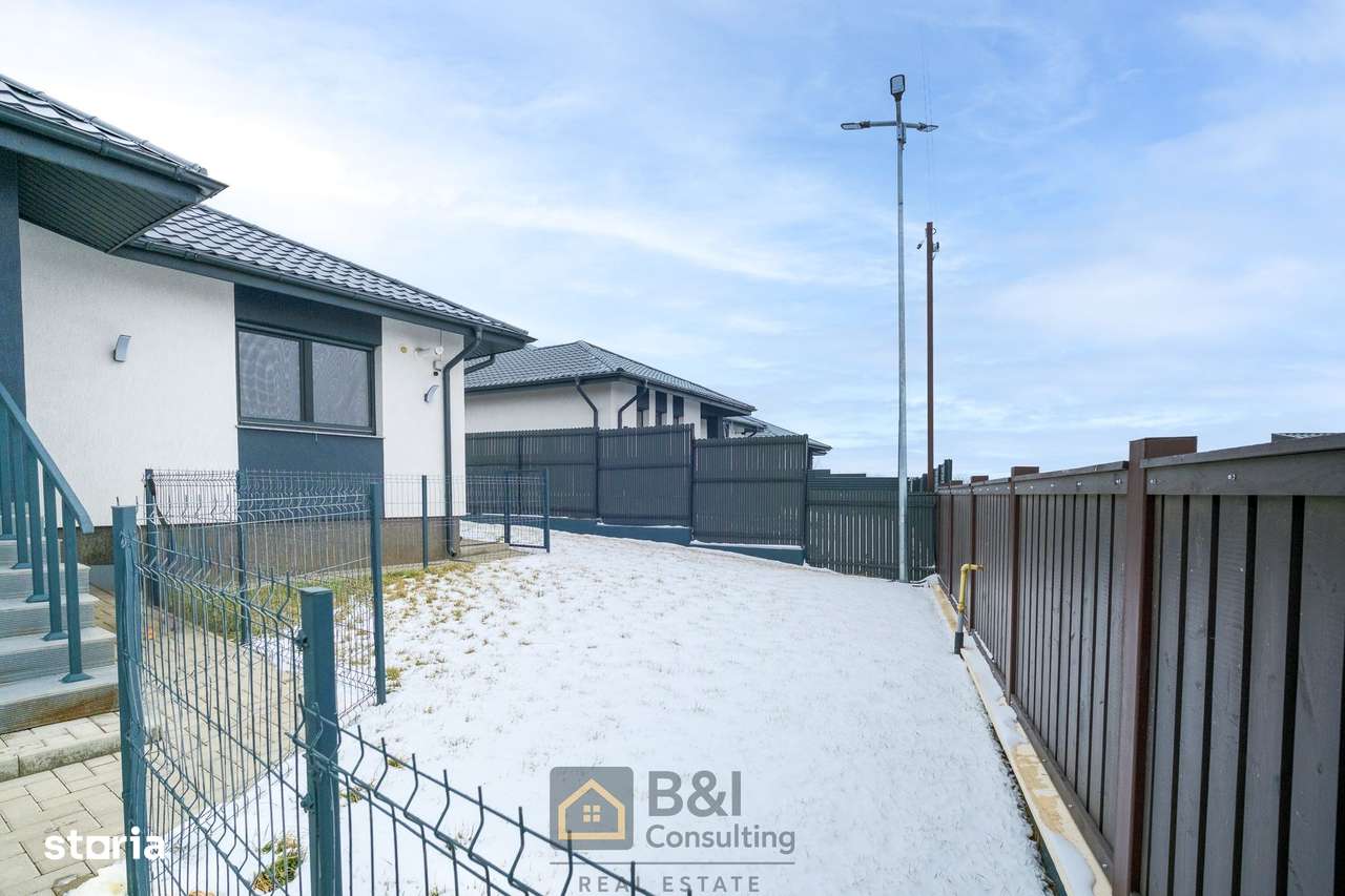 O casă construită responsabil, cu garaj si terasa imensa in Tomesti-9