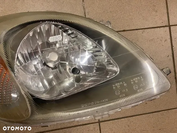 LAMPA PRZÓD PRAWA REFLEKTOR TOYOTA YARIS I - 4