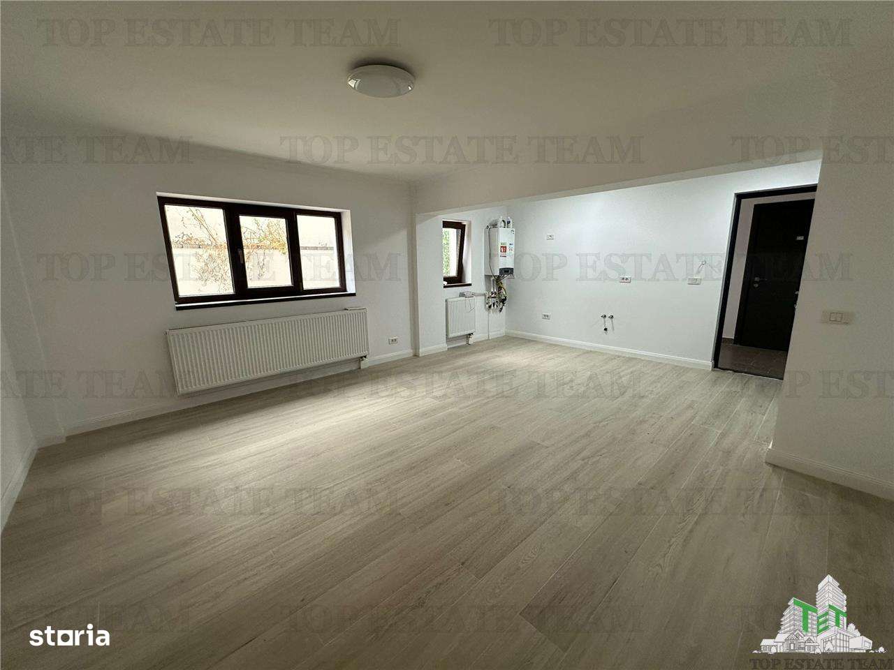 Apartament 2 camere si curte de vanzare Damaroaia