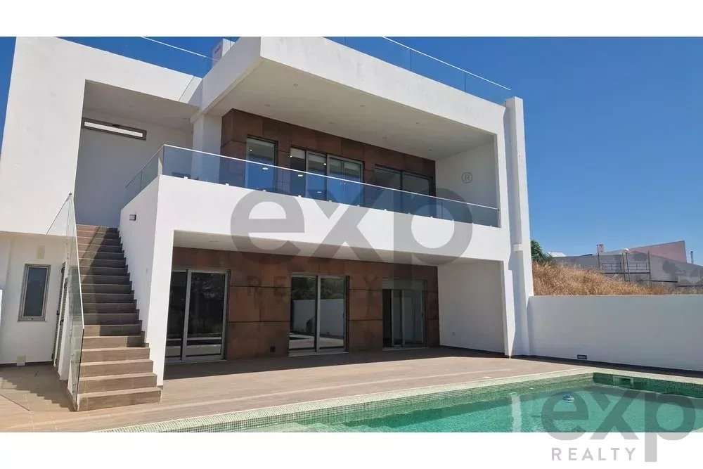 "Moradia Luxuosa com Vista para Rio e Mar em Mexiloeira Grande" - Grande imagem: 4/35