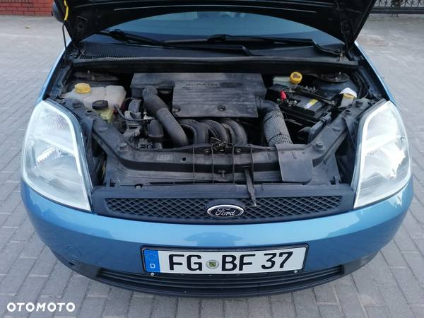 Ford Fiesta 1.4 Ghia - 8