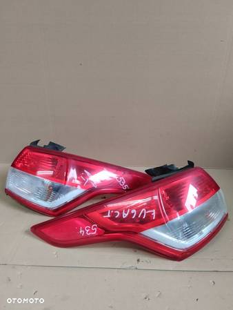 LAMPA PRAWA LEWA TYŁ TYLNA FORD KUGA MK1 - 2