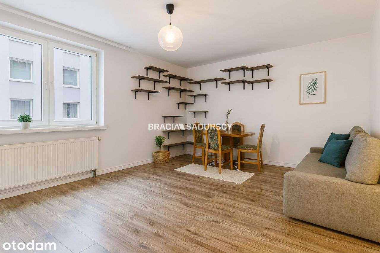 1 pok z osobną kuchnią ul.Wybickiego.-0