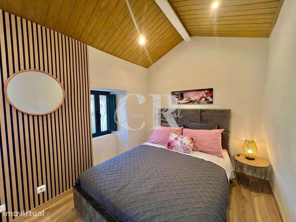 Moradia acolhedora no centro histórico com potencial de investimento-16