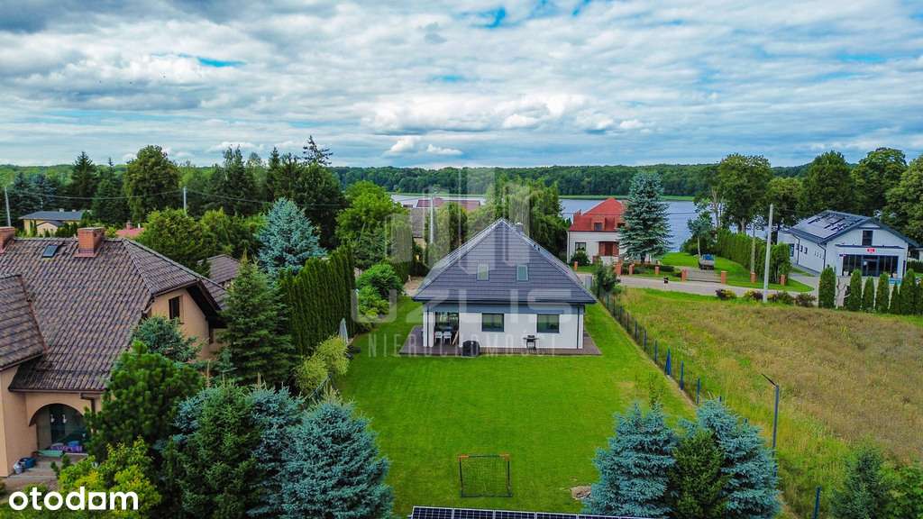 WYJĄTKOWA REZYDENCJA NAD JEZIORAKIEM