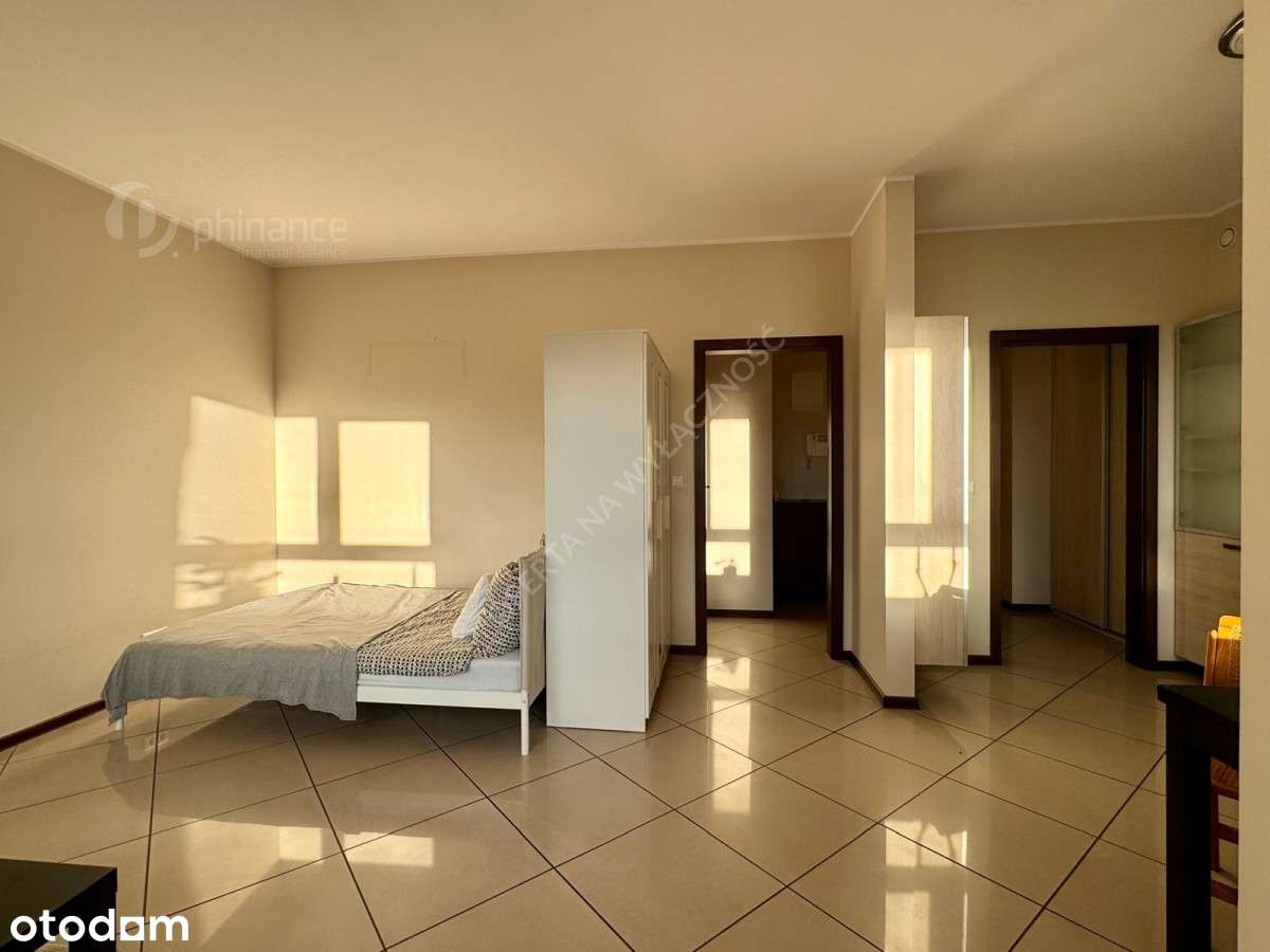 38m2, kawalerka, miejsce postojowe w hali-9