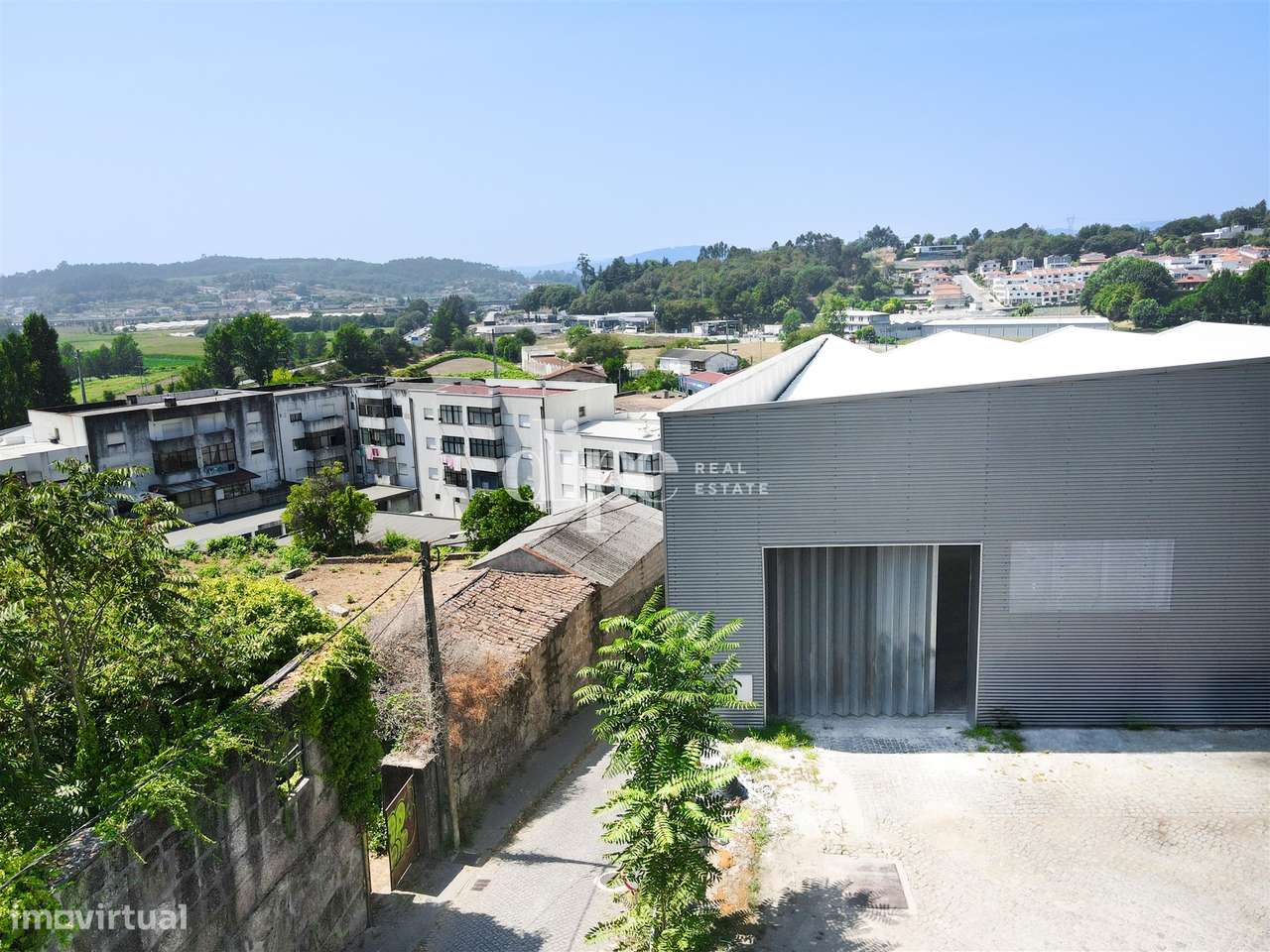 Arrendamento | Armazém de 2.434 m2 com escritório em Guimarães - Grande imagem: 4/17
