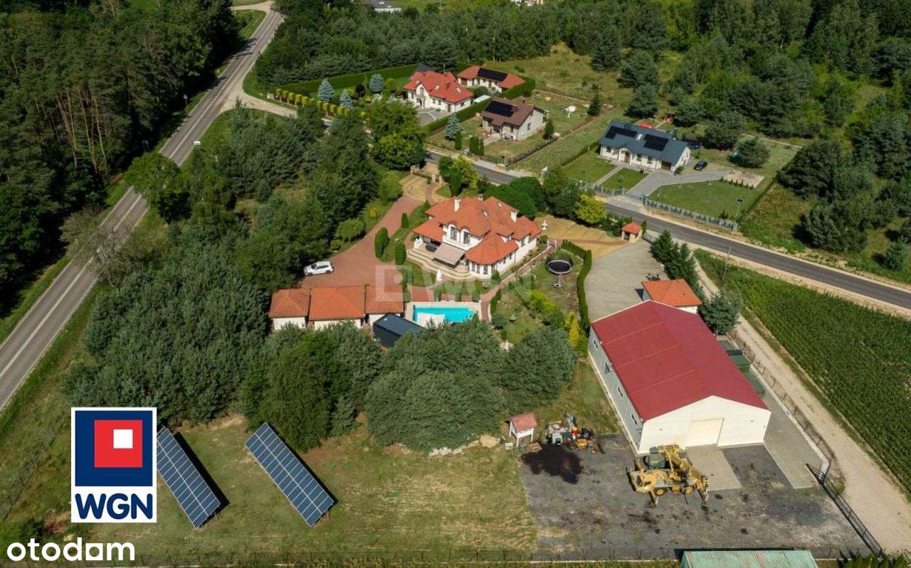 Luksus i funkcjonalność w otoczeniu natury – dom z basenem.-5