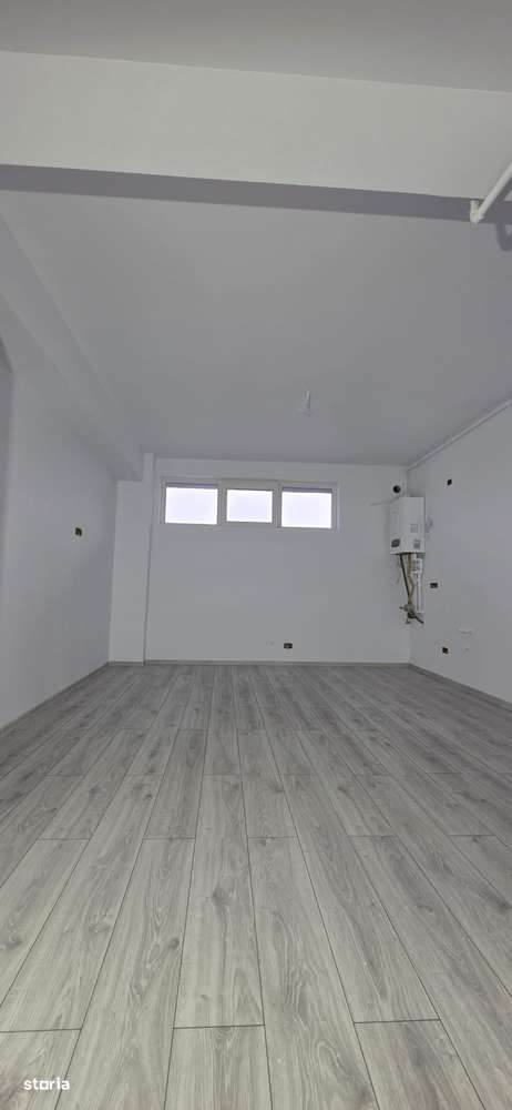 Apartament cu balcon, demisol – construcție nouă- strada principala-0