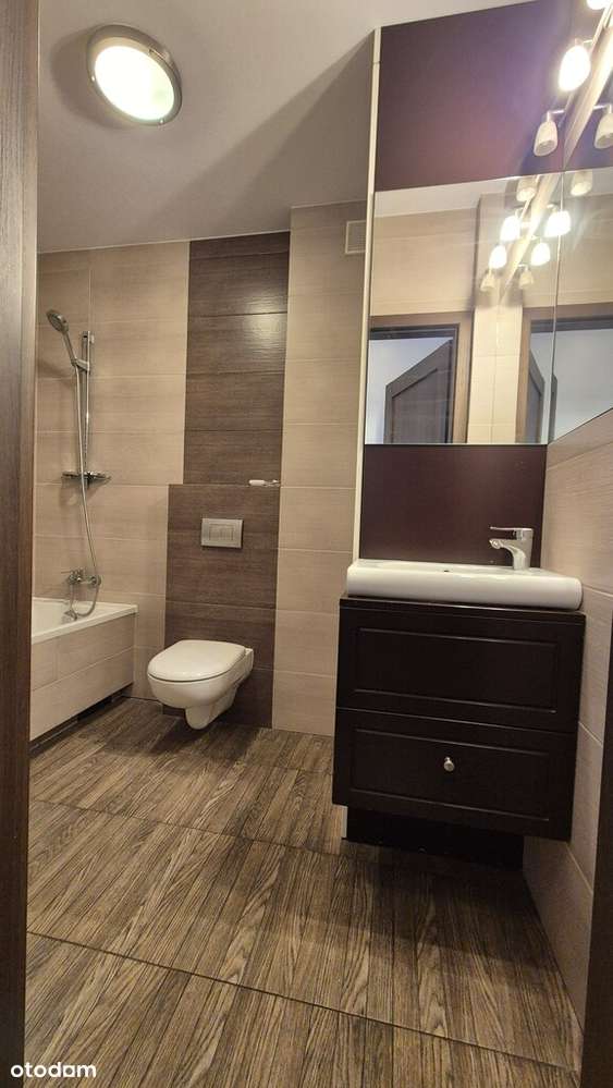 dwupoziomowe z ogródkiem i garażem na Plewiskach-12