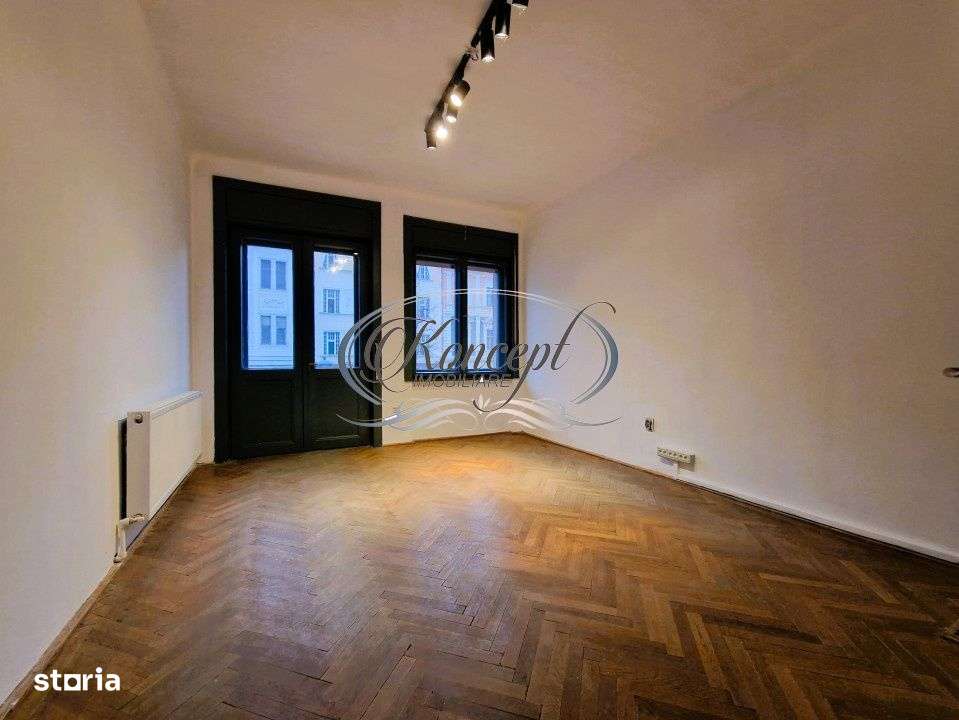 Apartament central cu farmec istoric pe Bulevardul Eroilor - Imagine principală: 4/14
