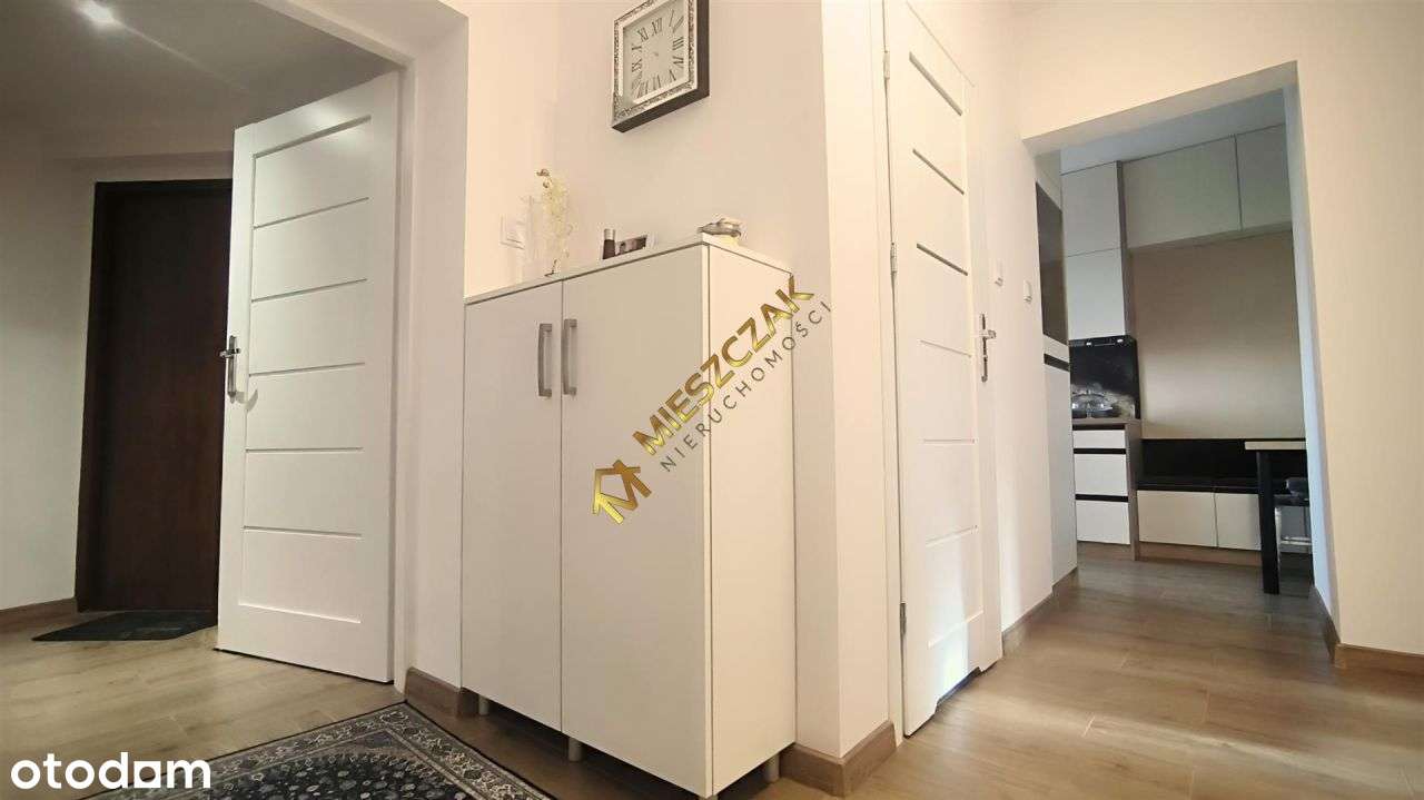 Częśc domu z ogrodem i dwoma lokalami użytkowymi w-12