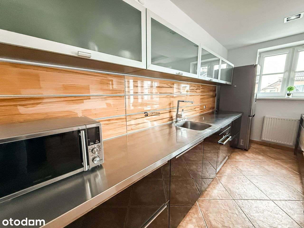 67m2, 3 pokoje, piwnica 10m2, 9183zł/m2-2