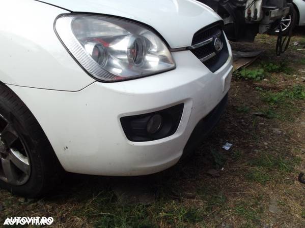 Bara fata Kia Carens 2006-2013 dezmembrez kia Carens 2.0crdi manuala - 2