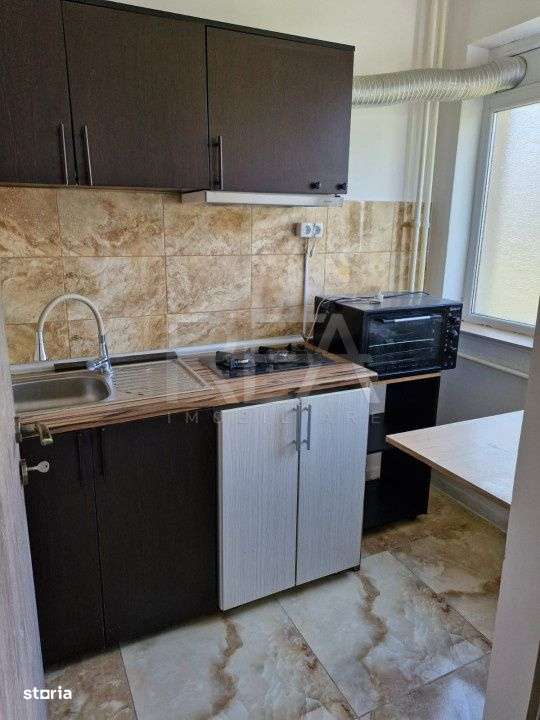 Garsoniera foarte aproape de toate mijloacele de transport in cartieru - Imagine principală: 5/11