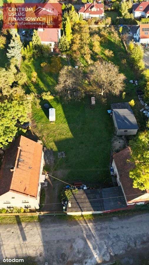 Działka budowlana z domem i zabudowaniami gospodar-1