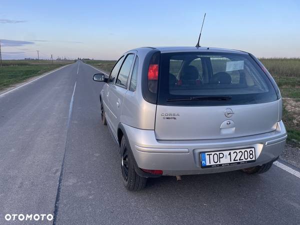 Opel Corsa 1.0 12V Cosmo - 6