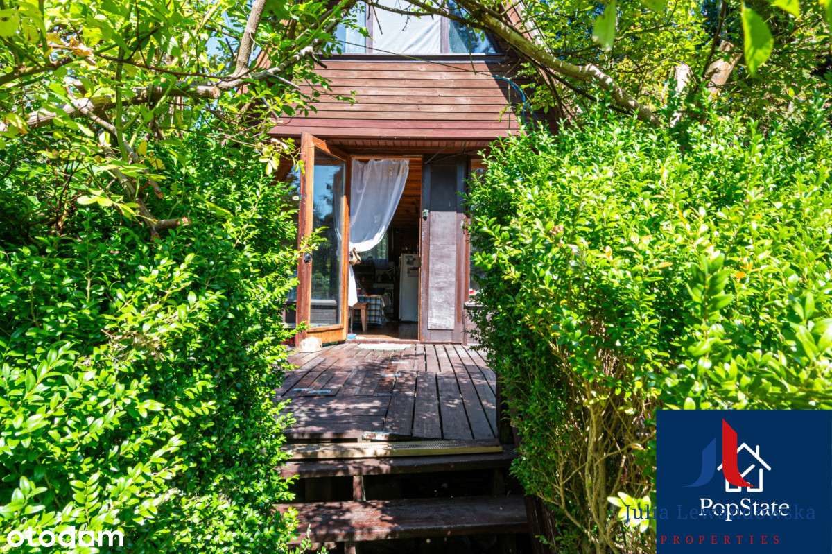 Działka budowlana z domkiem letniskowym-1