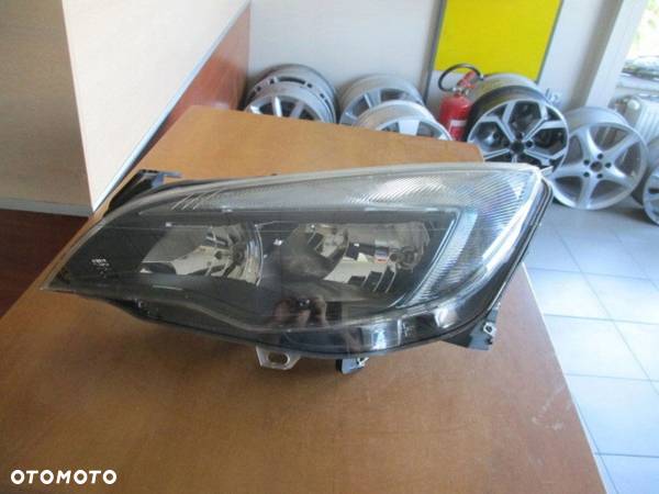 LAMPA PRZEDNIA LEWA OPEL ASTRA IV LIFT - 1