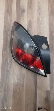 Lampa lewa lewy tył Opel Astra H 3D 2006r. 24451832 - 4