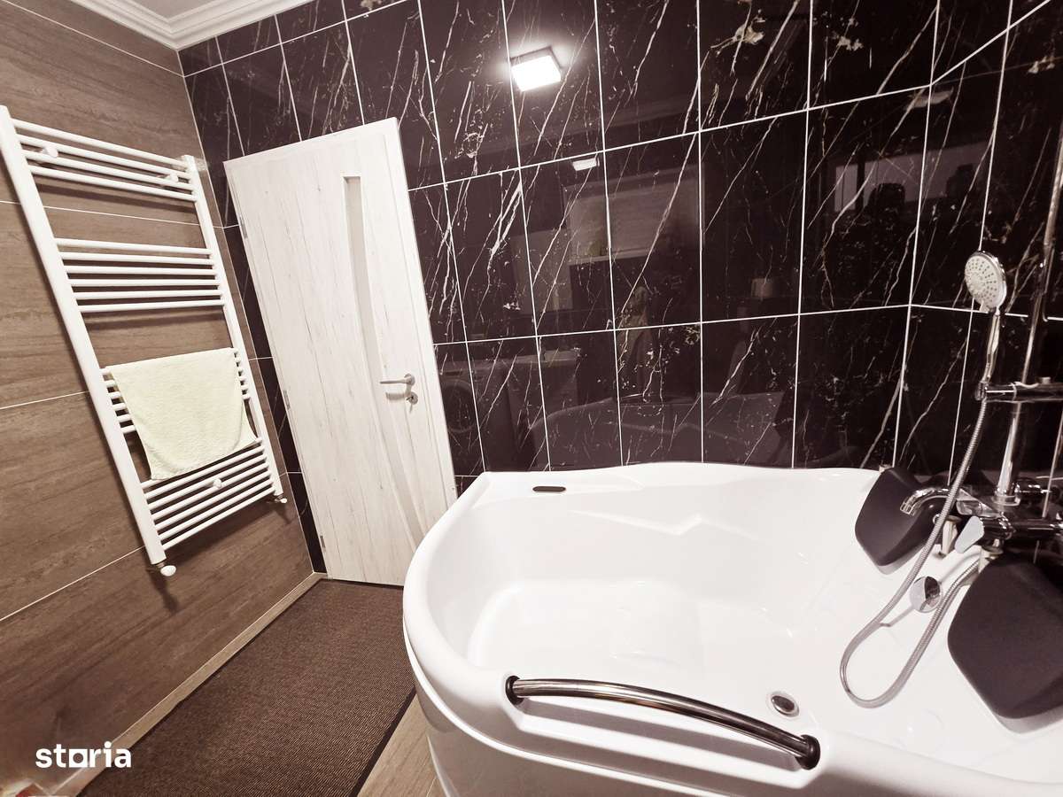 CASA MODERNA 4 camere 2 bai 210 mp Garaj Teren 1050 mp CIURBESTI-15