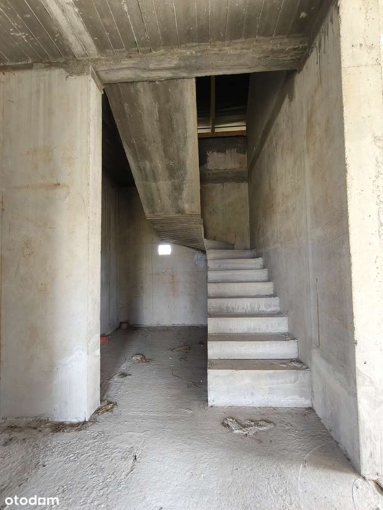 Nowoczesny dom w stanie surowym  z garażem w spokojnej okolicy-11