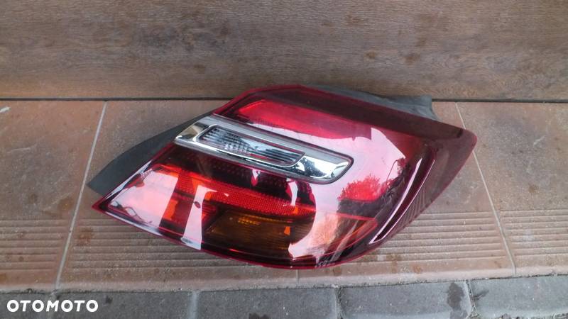 Lampa tylna lewa Opel Insignia I lift HB - 1