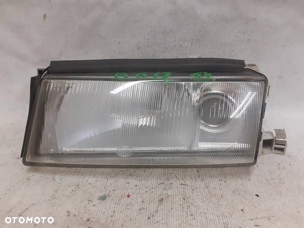 .  PRZOD PRZEDNIA LAMPA LEWA SKODA OCTAVIA I - 1