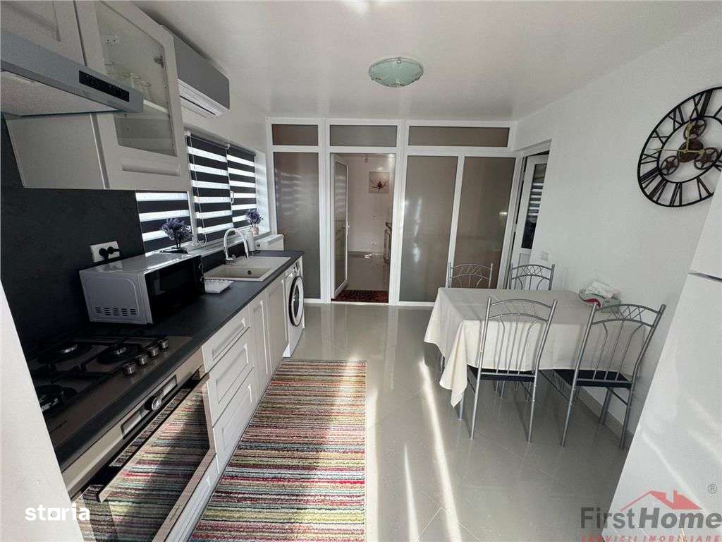 Garsoniera 45 mp (FACTURI INCLUSE), curte+ foisor, parcare - Imagine principală: 3/12