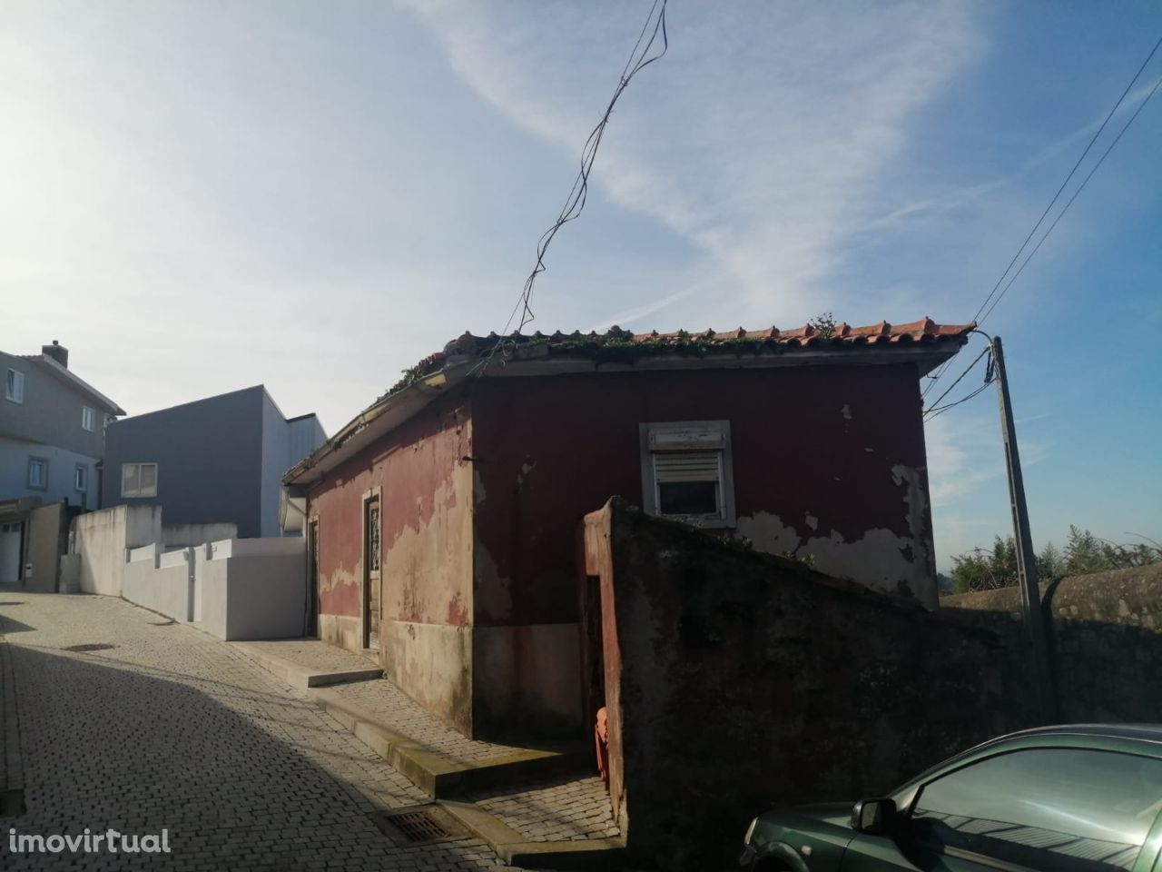 Moradia com vista mar para reabilitar na Madalena