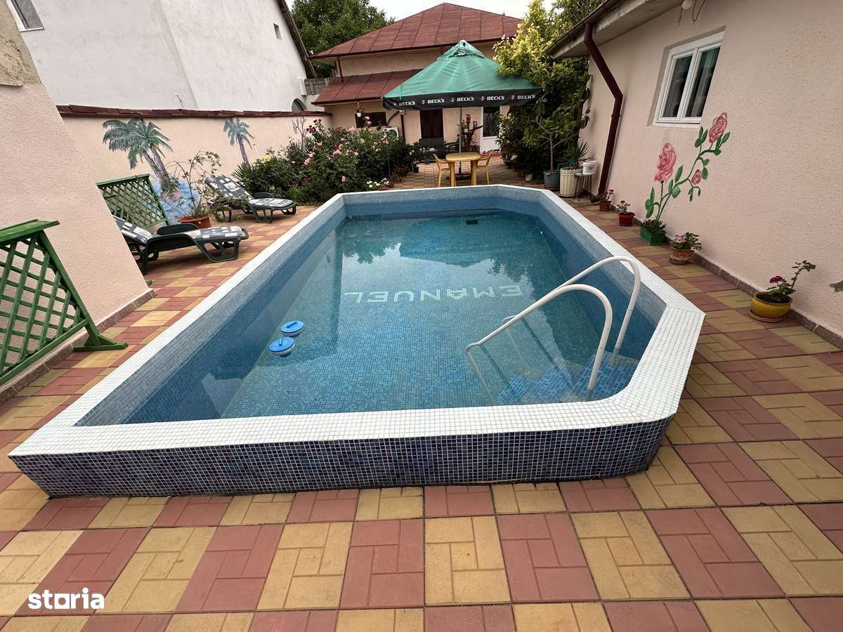 Proprietate ultracentrala cu piscina + garaj si anexa - Imagine principală: 4/10