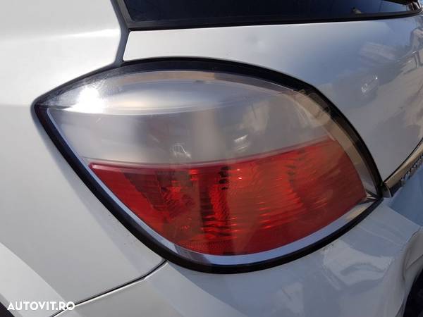 Tripla / Lampa / Stop Stanga Opel Astra H Hatchback 2004 - 2010 - 2