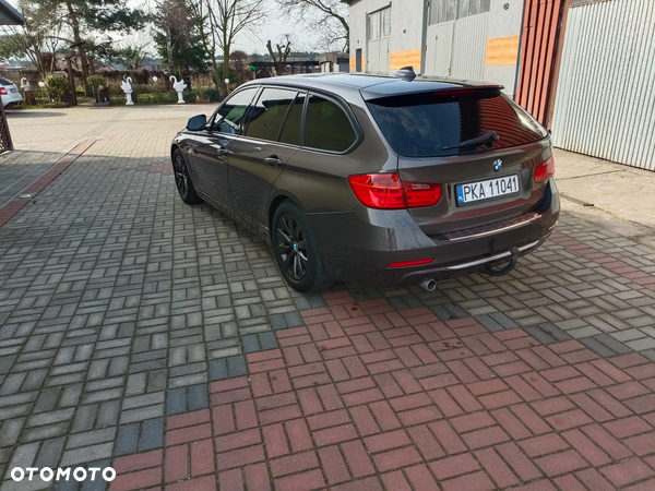 BMW Seria 3 318d DPF Touring Edition Lifestyle - 11