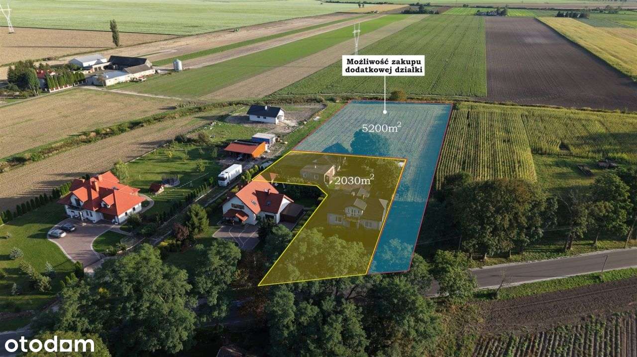 Dom z garażem i budynkiem gospodarczym-19