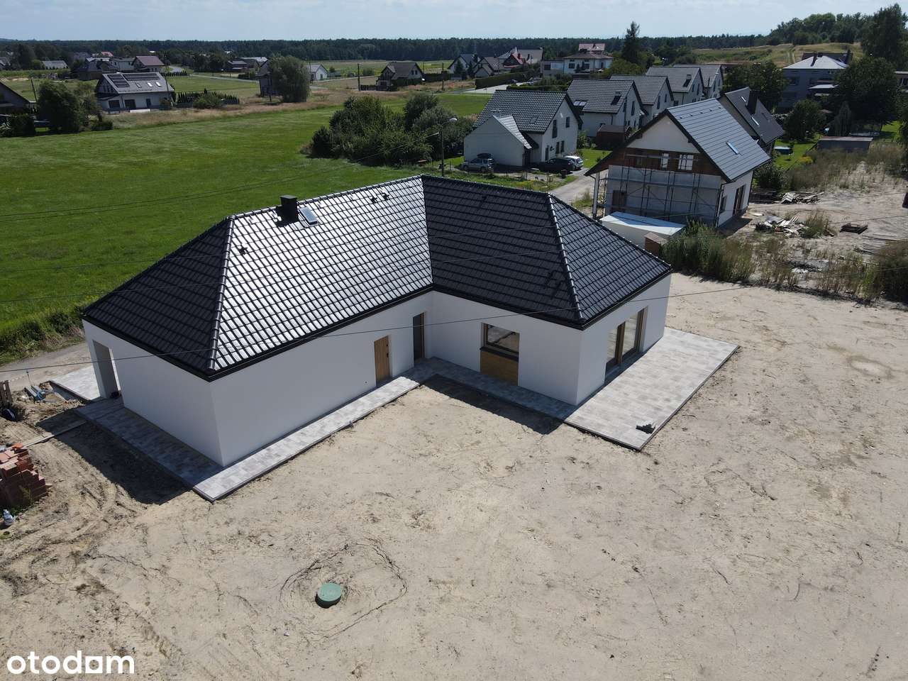 Atrakcyjny nowy dom na dużej działce 7 pokoi.-3