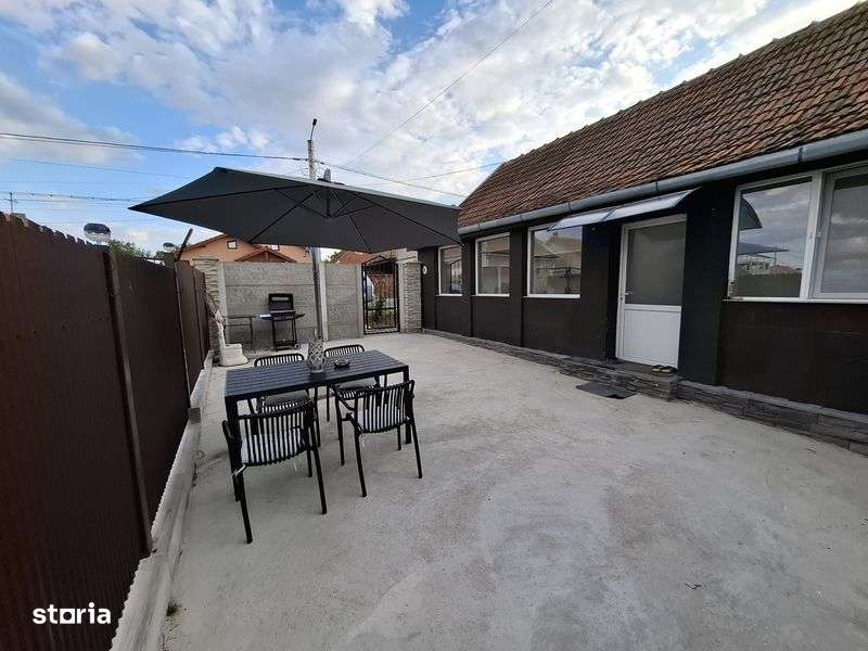 Inchiriez in regim hotelier casa in Buzias - Imagine principală: 5/8