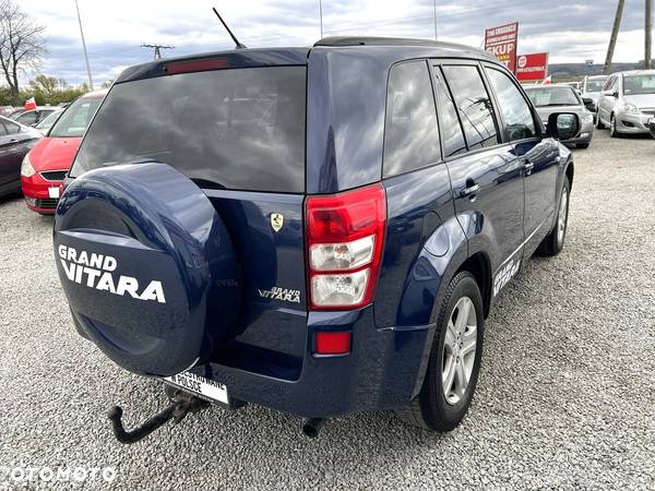 Suzuki Grand Vitara 2.0 - 7