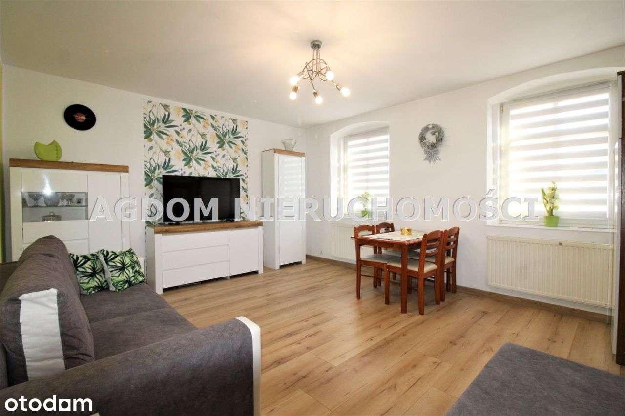 Klimatyczne mieszkanie w niezwykłej lokalizacji - Pełny obrazek: 1/17