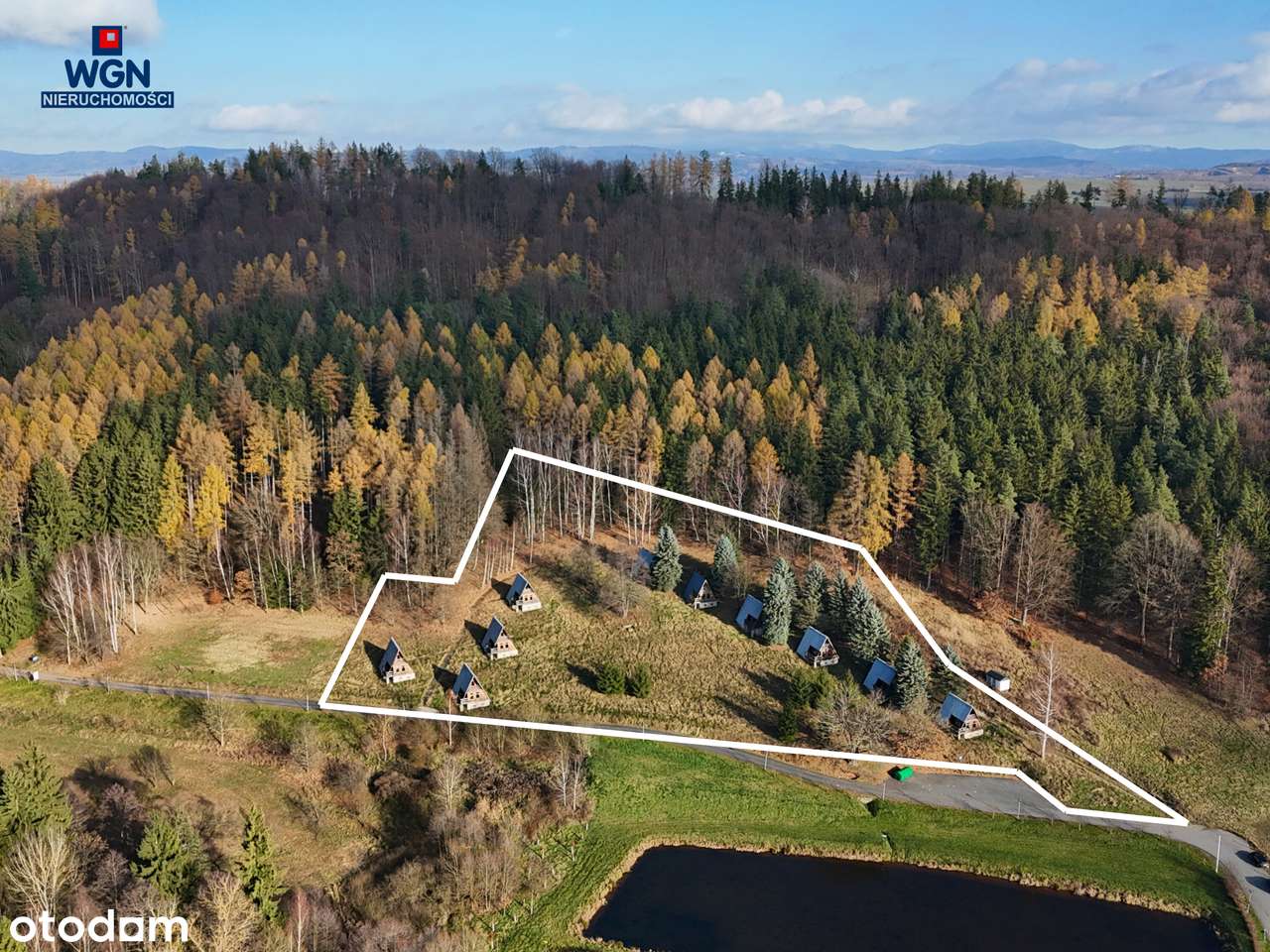Grunt zabudowany 10-ma domkami nad jeziorem - na sprzedaż.-6