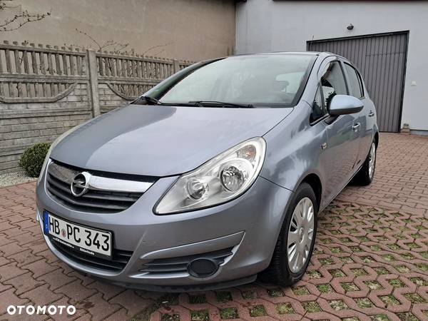 Opel Corsa 1.2 16V Cosmo - 1