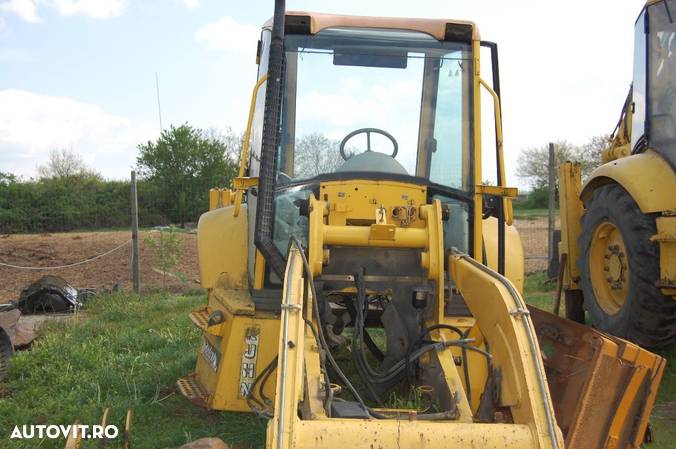 Dezmembrez KOMATSU WB 93 R2 - 2