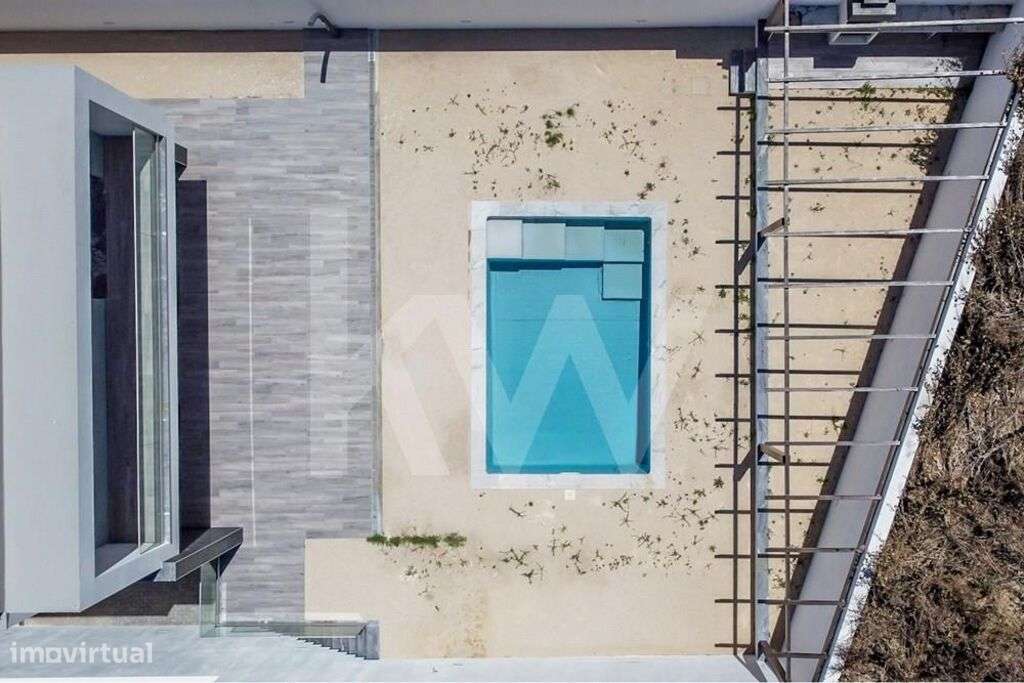 Moradia T4 Isolada com Piscina e Acabamentos de Alta Qualidade em Odiv - Grande imagem: 5/49